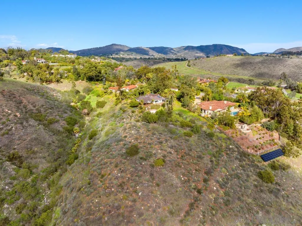 16574 Zumaque Rancho Santa Fe, CA 92067 - Photo 31 of 47 a view of a city with mountains in the background