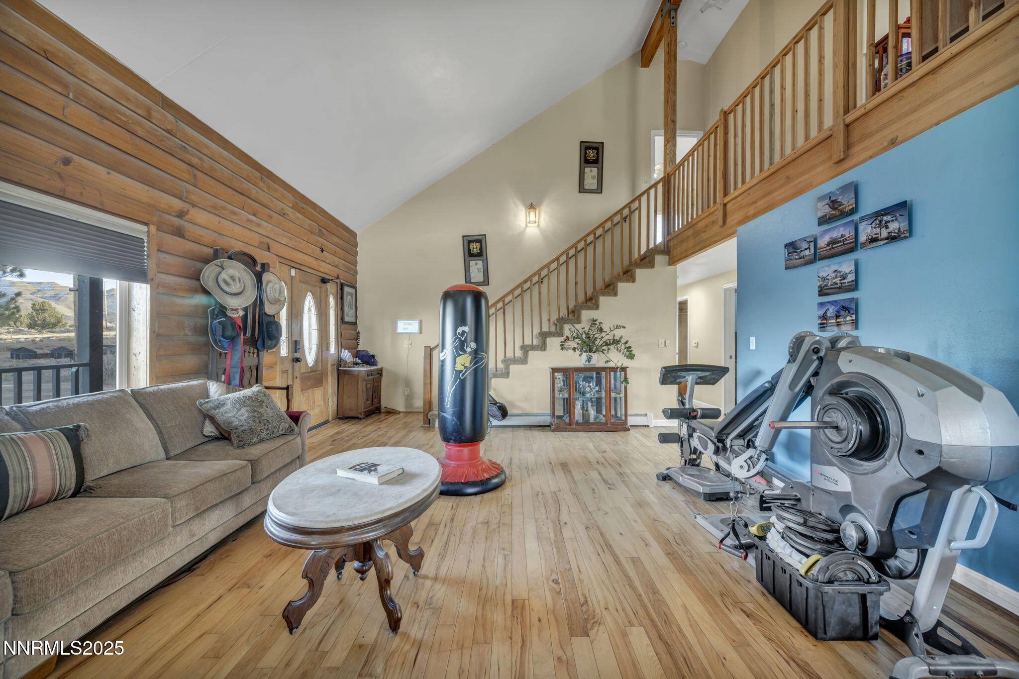 15034 North Red Rock Road Reno, NV 89508 - Photo 16 of 40 a living room with furniture and a wooden floor