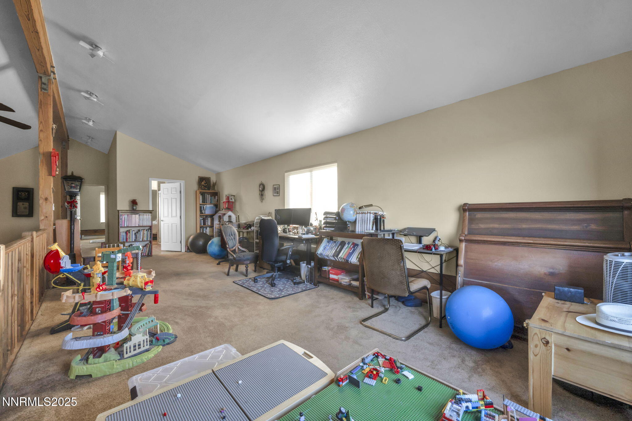 15034 North Red Rock Road Reno, NV 89508 - Photo 19 of 40 a living room with furniture and a table
