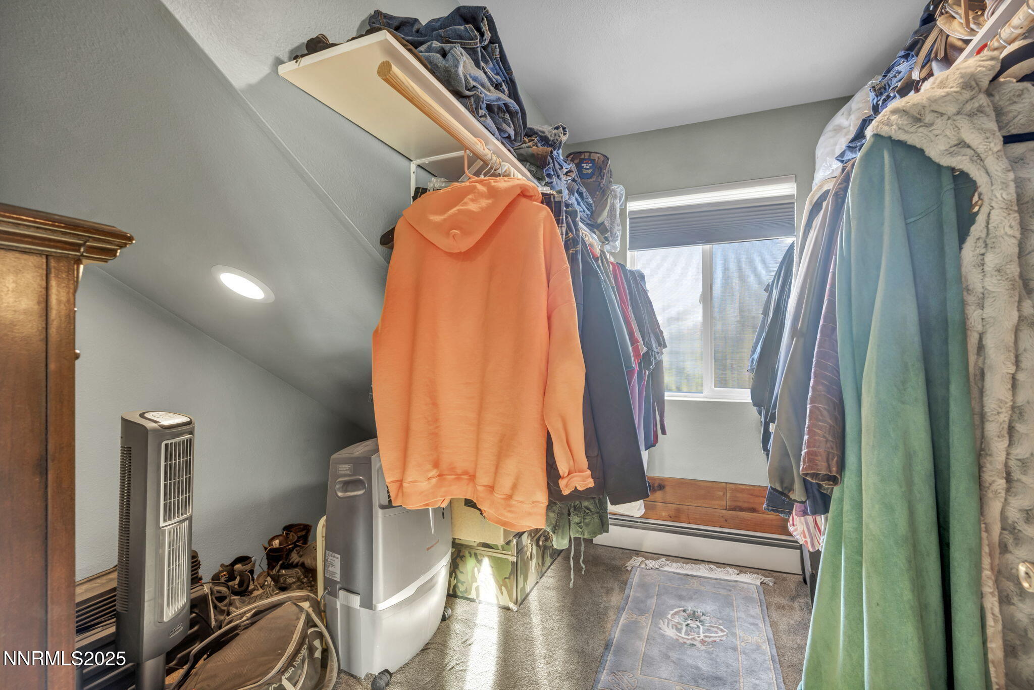 15034 North Red Rock Road Reno, NV 89508 - Photo 23 of 40 a view of walk in closet with clothes and shoes