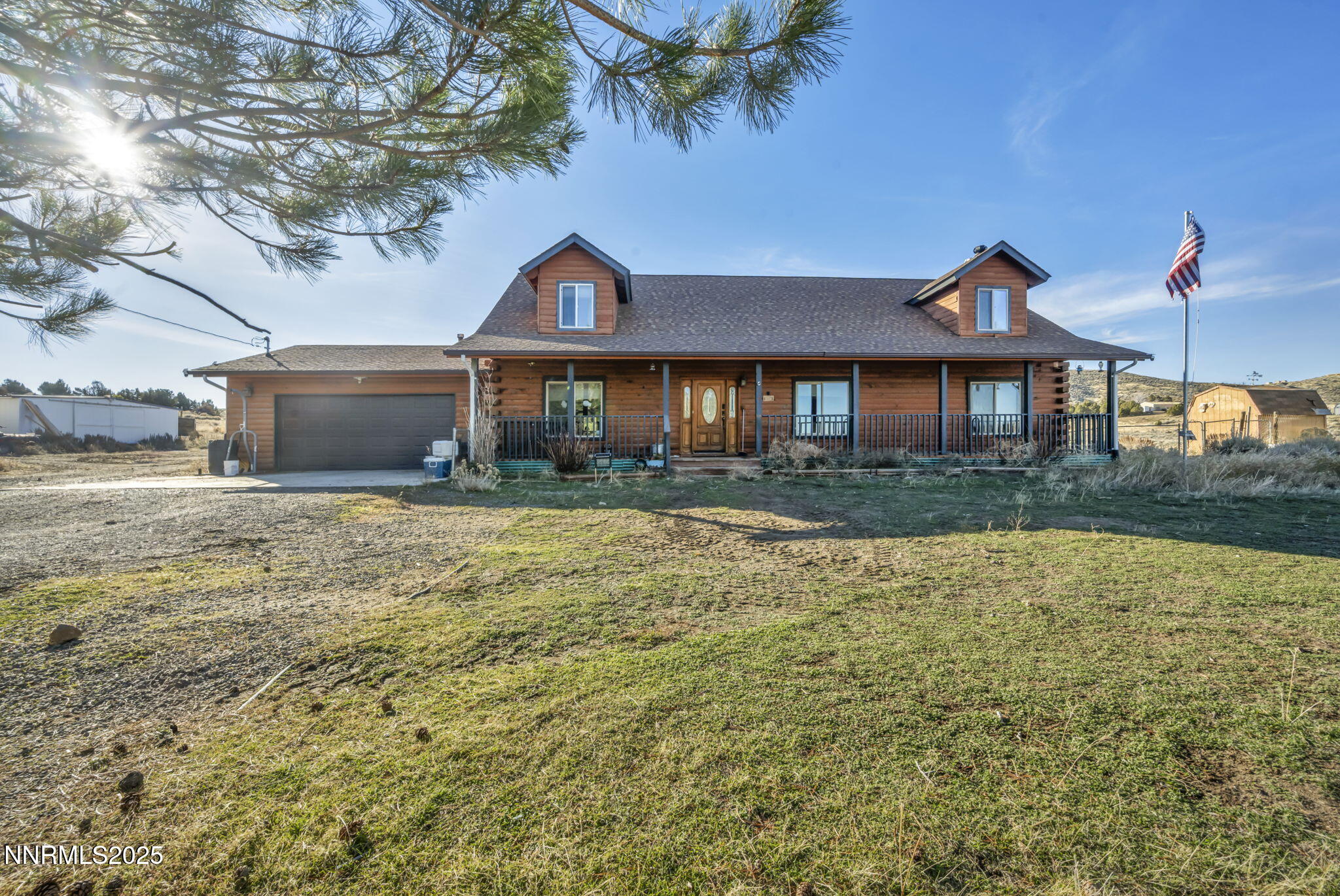 15034 North Red Rock Road Reno, NV 89508 - Photo 3 of 40 a front view of a house with a yard