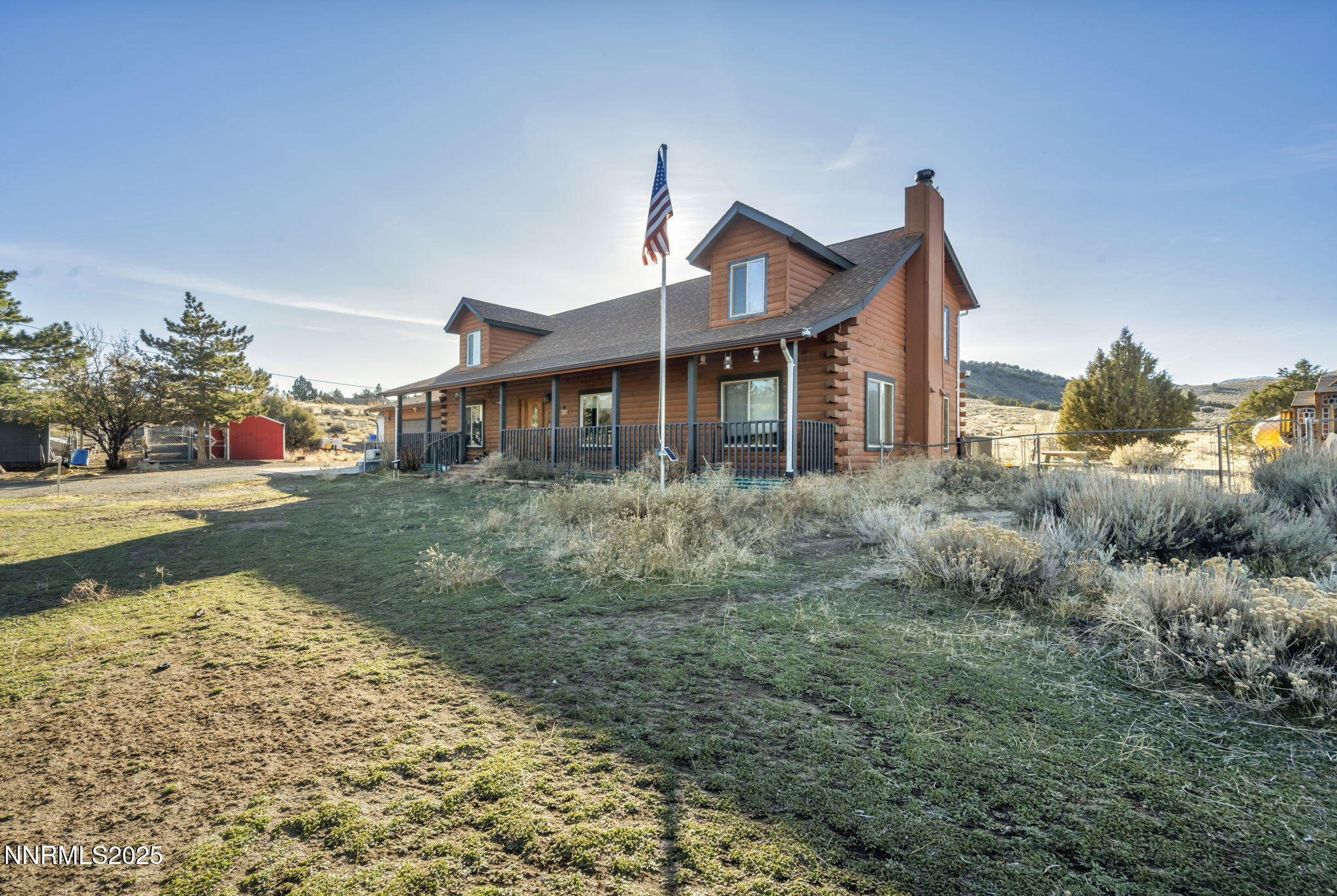 15034 North Red Rock Road Reno, NV 89508 - Photo 4 of 40 a front view of a house with garden