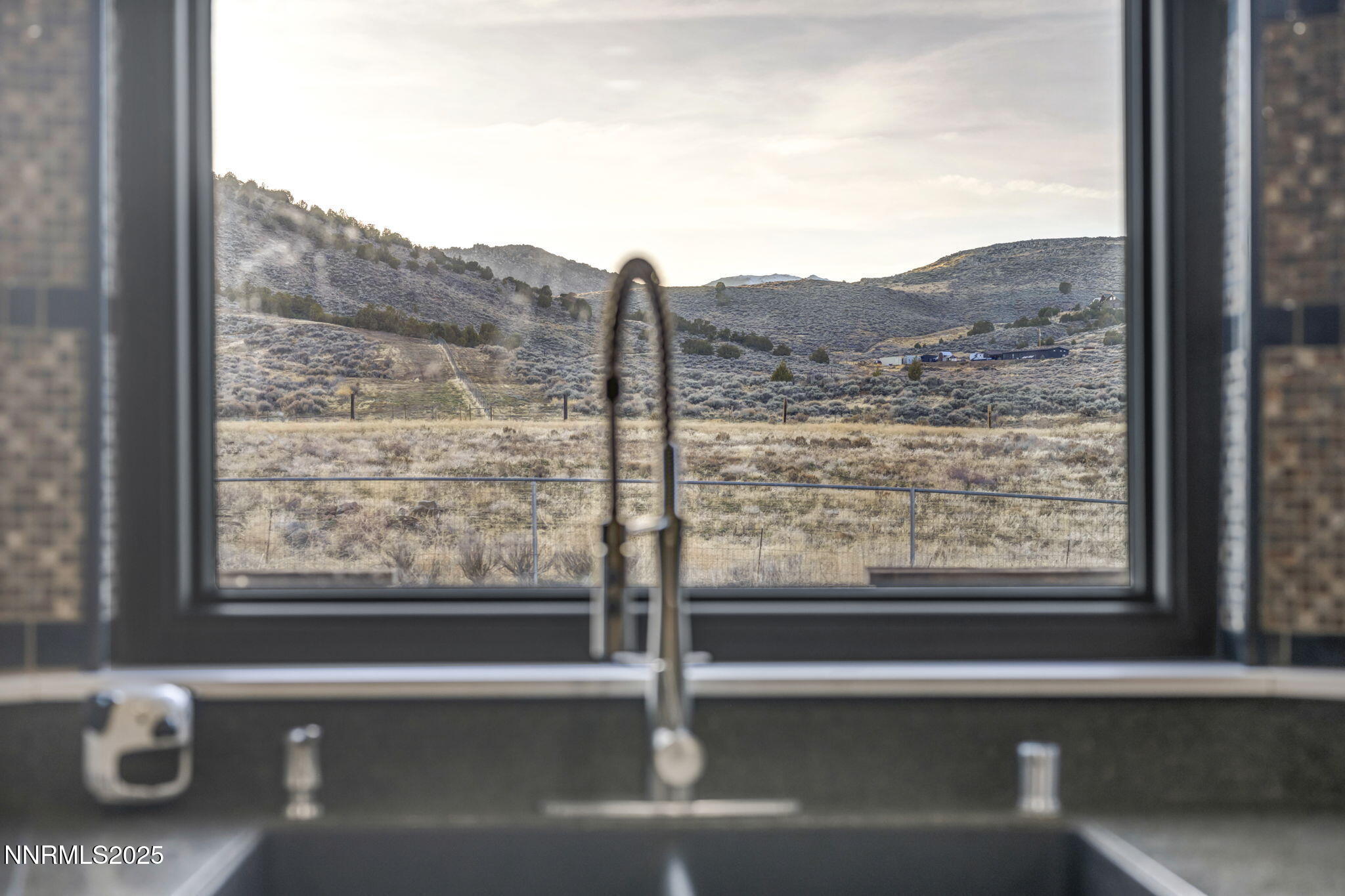 15034 North Red Rock Road Reno, NV 89508 - Photo 6 of 40 a view of a balcony from a window
