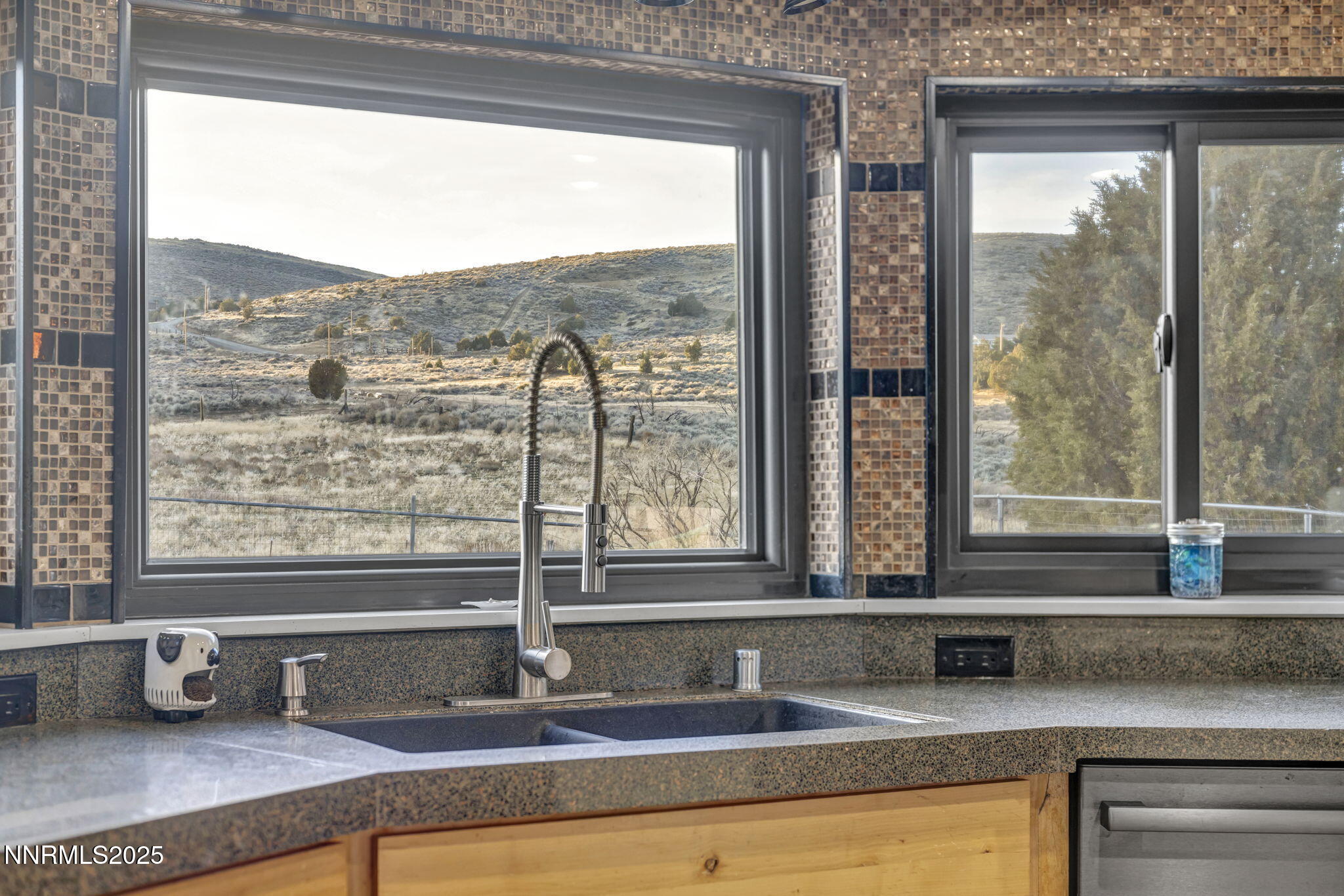 15034 North Red Rock Road Reno, NV 89508 - Photo 7 of 40 a kitchen with a sink and a window