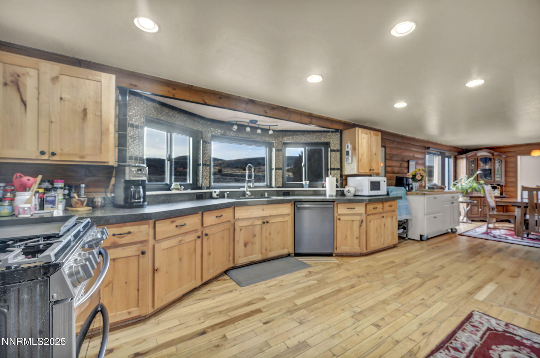 15034 North Red Rock Road Reno, NV 89508 - Photo 9 of 40 a kitchen with lots of counter top space and appliances