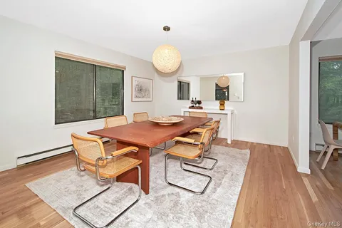 a view of a dining room with furniture