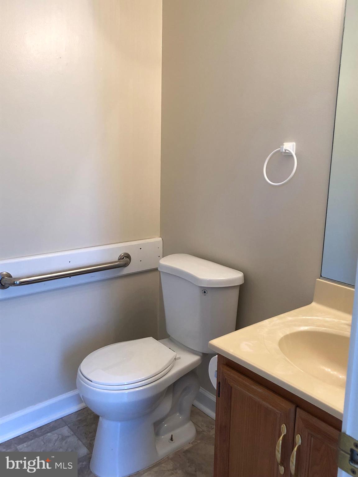 6412 View Point Court Frederick, MD 21703 - Photo 13 of 38 a white toilet sitting next to a white sink