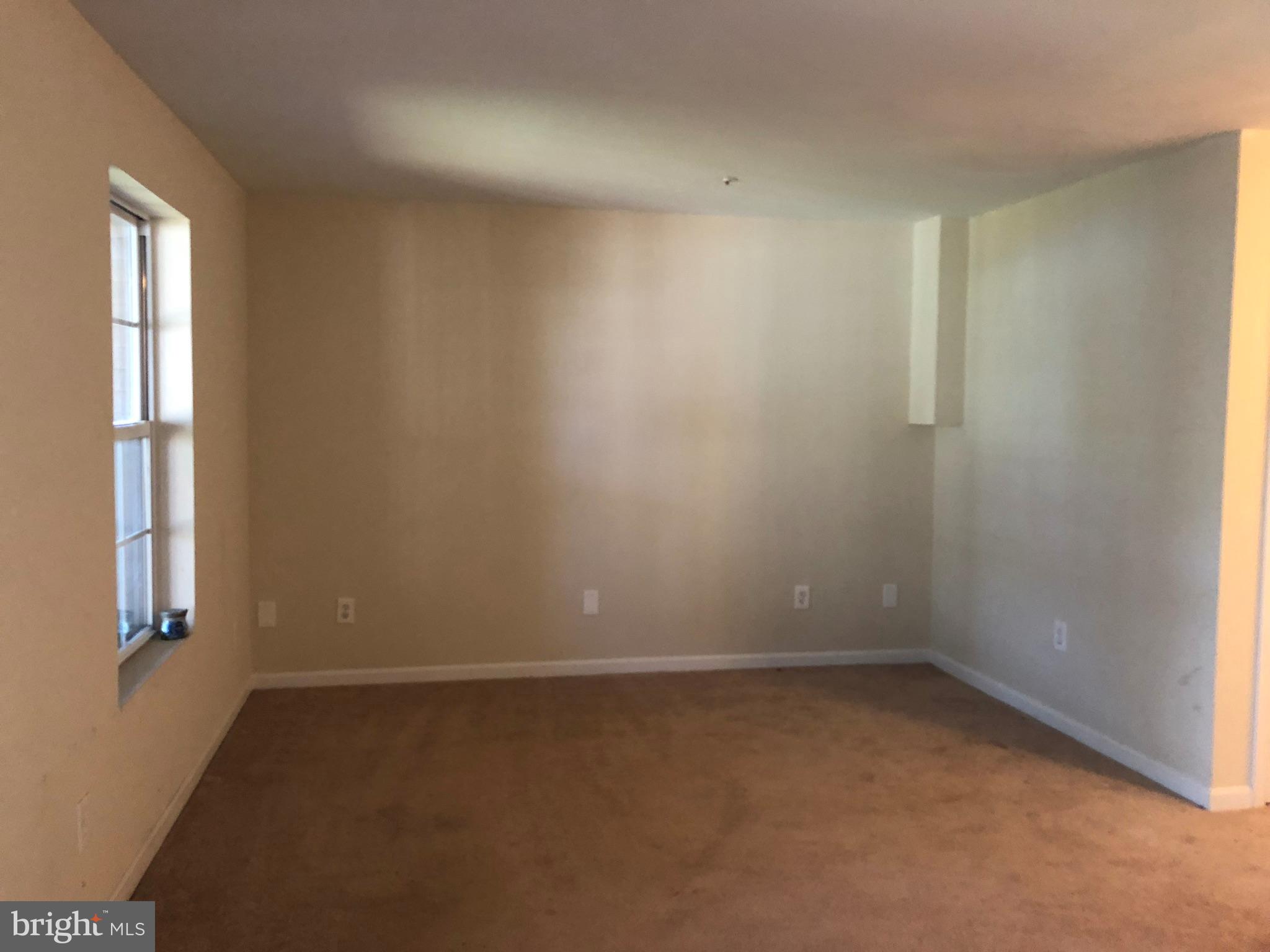 6412 View Point Court Frederick, MD 21703 - Photo 23 of 38 an empty room with windows