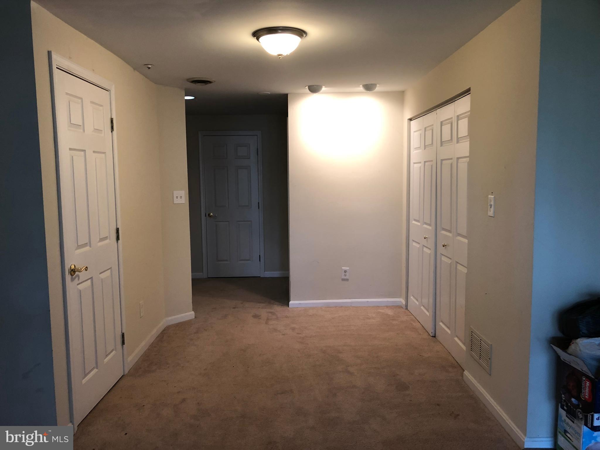 6412 View Point Court Frederick, MD 21703 - Photo 24 of 38 an empty room with closet and wooden floor