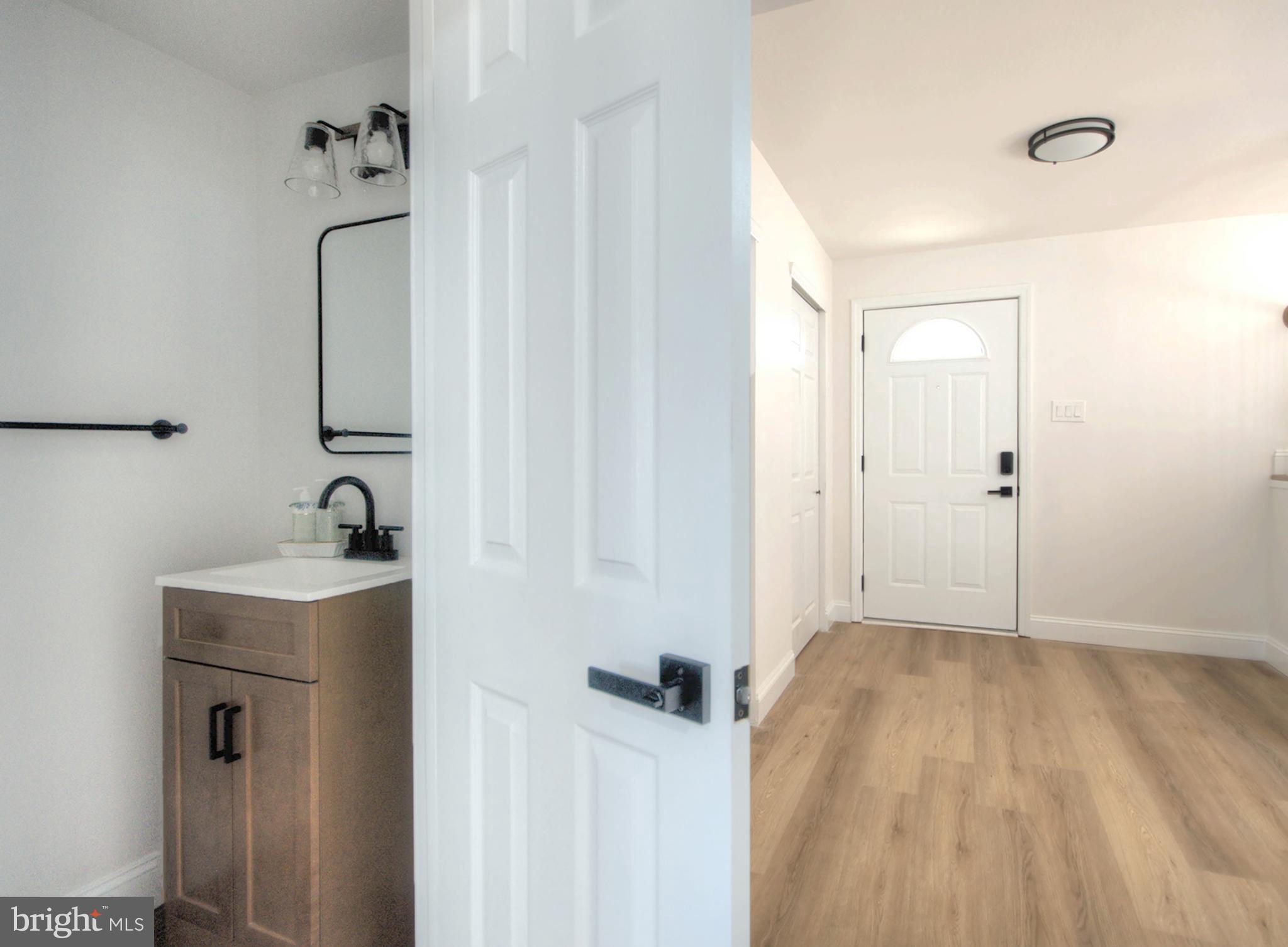 924 Cropwell Road Cherry Hill, NJ 08003 - Photo 26 of 76 Bright entryway with modern bathroom access.