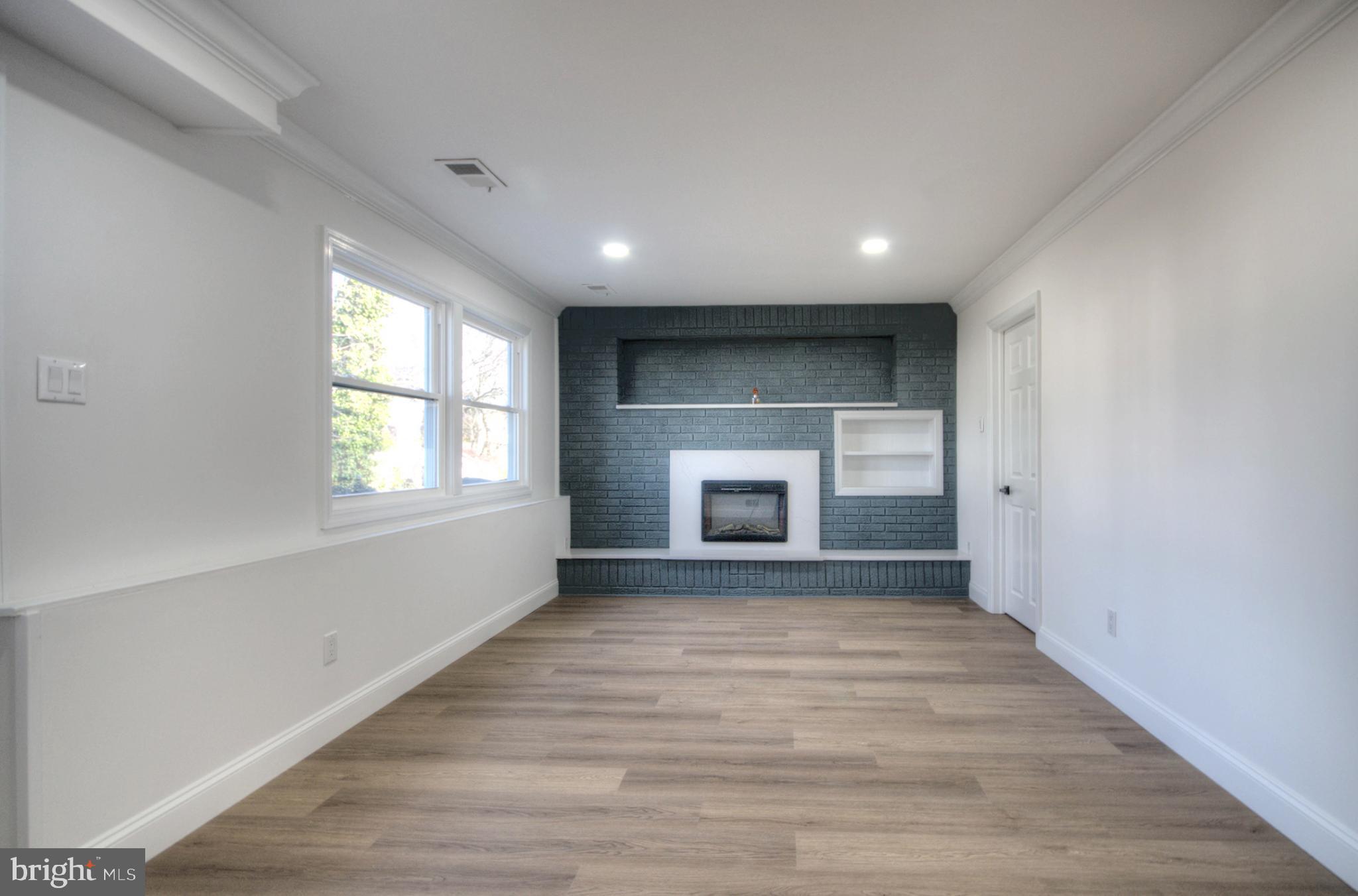 924 Cropwell Road Cherry Hill, NJ 08003 - Photo 30 of 76 Modern living space with stylish fireplace.