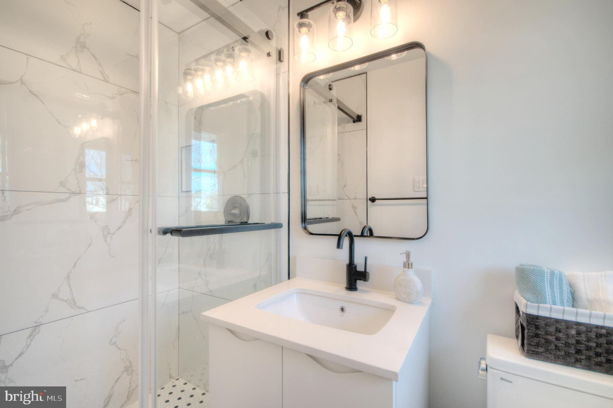 924 Cropwell Road Cherry Hill, NJ 08003 - Photo 65 of 76 Sleek modern bathroom with elegant finishes.