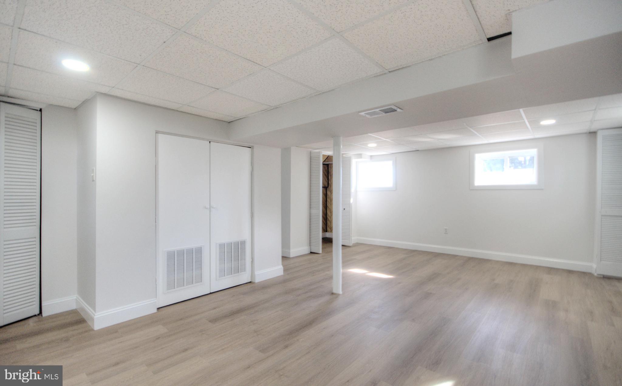 924 Cropwell Road Cherry Hill, NJ 08003 - Photo 74 of 76 a view of an empty room with wooden floor