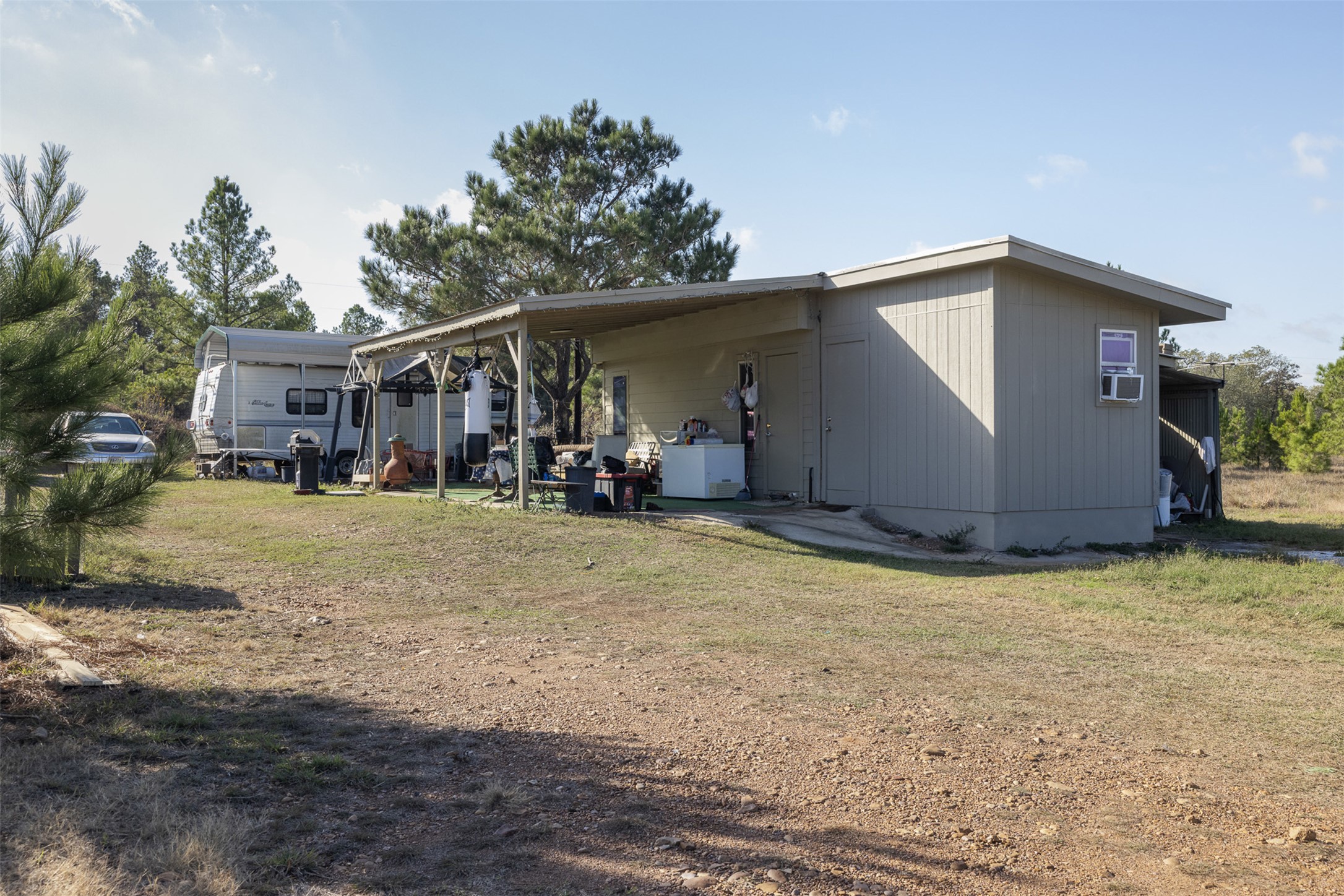 1759 Gotier Trace Road Paige, TX 78659 - Photo 32 of 40 a view of a house with backyard