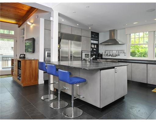 79 Bush Avenue Greenwich, CT 06830 - Photo 11 of 19 a kitchen with stainless steel appliances granite countertop a sink a stove and a refrigerator