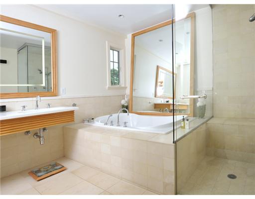 79 Bush Avenue Greenwich, CT 06830 - Photo 15 of 19 a spacious bathroom with a tub sink and mirror