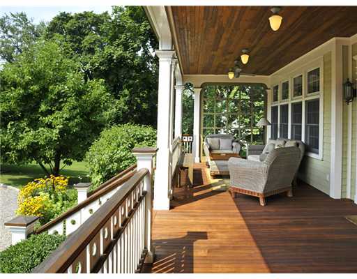 79 Bush Avenue Greenwich, CT 06830 - Photo 4 of 19 a balcony with furniture and wooden floor