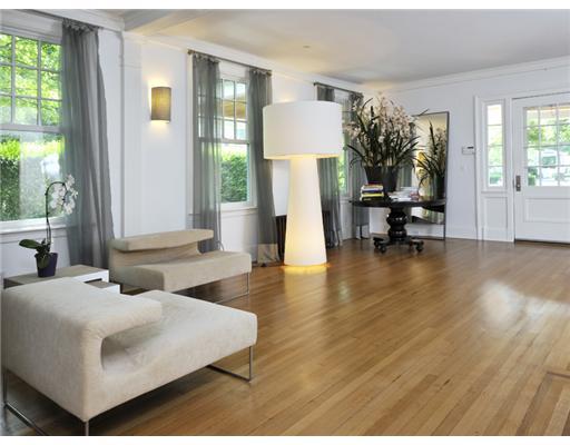 79 Bush Avenue Greenwich, CT 06830 - Photo 5 of 19 a living room with furniture and large windows
