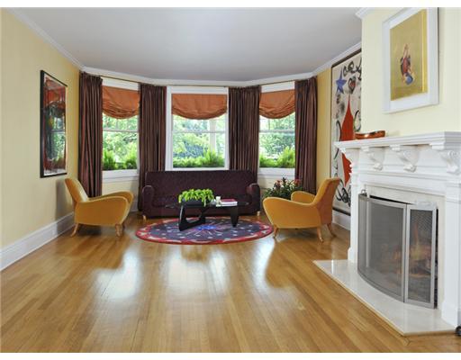 79 Bush Avenue Greenwich, CT 06830 - Photo 7 of 19 a living room with furniture and a fireplace