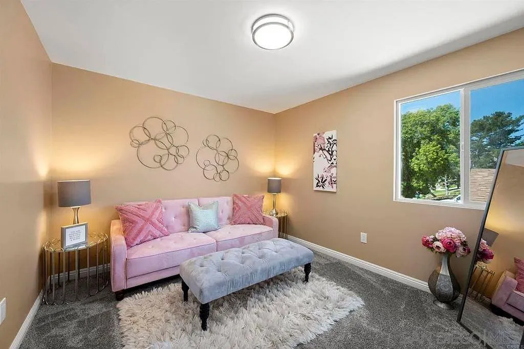 909 Concepcion Avenue Spring Valley, CA 91977 - Photo 23 of 27 a living room with furniture and a window