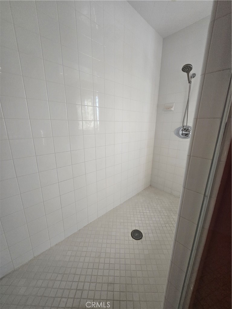 16231 Yarmouth Circle Riverside, CA 92503 - Photo 12 of 27 a bathroom with a shower