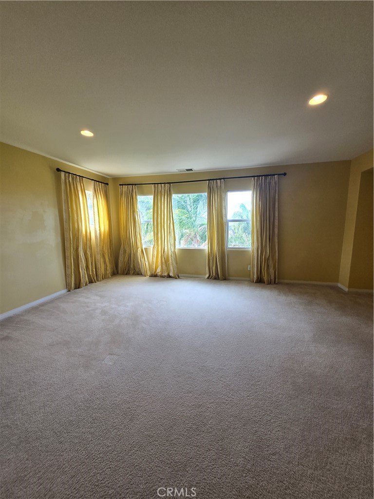 16231 Yarmouth Circle Riverside, CA 92503 - Photo 13 of 27 a view of livingroom with windows and yard