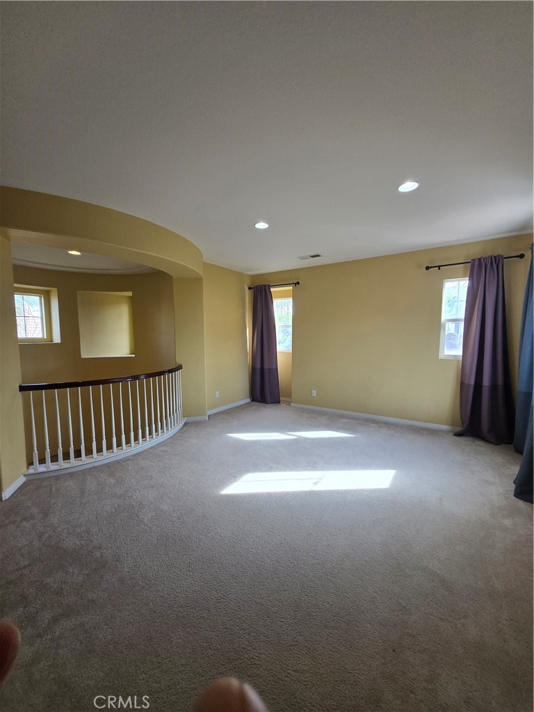 16231 Yarmouth Circle Riverside, CA 92503 - Photo 16 of 27 a view of an empty room and window