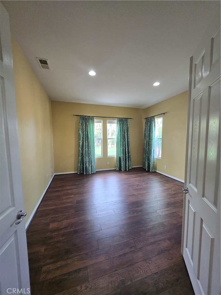 16231 Yarmouth Circle Riverside, CA 92503 - Photo 22 of 27 a view of livingroom with hardwood floor and window