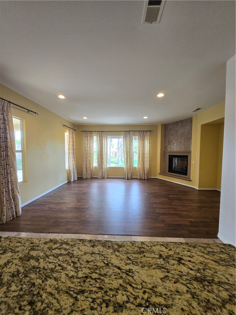 16231 Yarmouth Circle Riverside, CA 92503 - Photo 4 of 27 a view of empty room with wooden floor