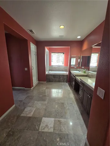a view of entryway with kitchen