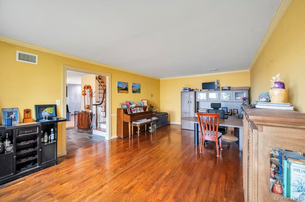 39 Bevin Road Northport, NY 11768 - Photo 21 of 44 Home office with ornamental molding and wood finished floors