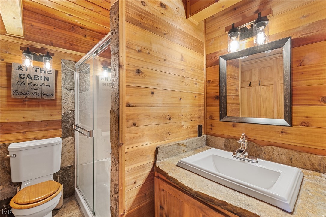 20102 Hibbet Trail Reno, NV 89511 - Photo 25 of 34 a bathroom with a sink toilet vanity and shower