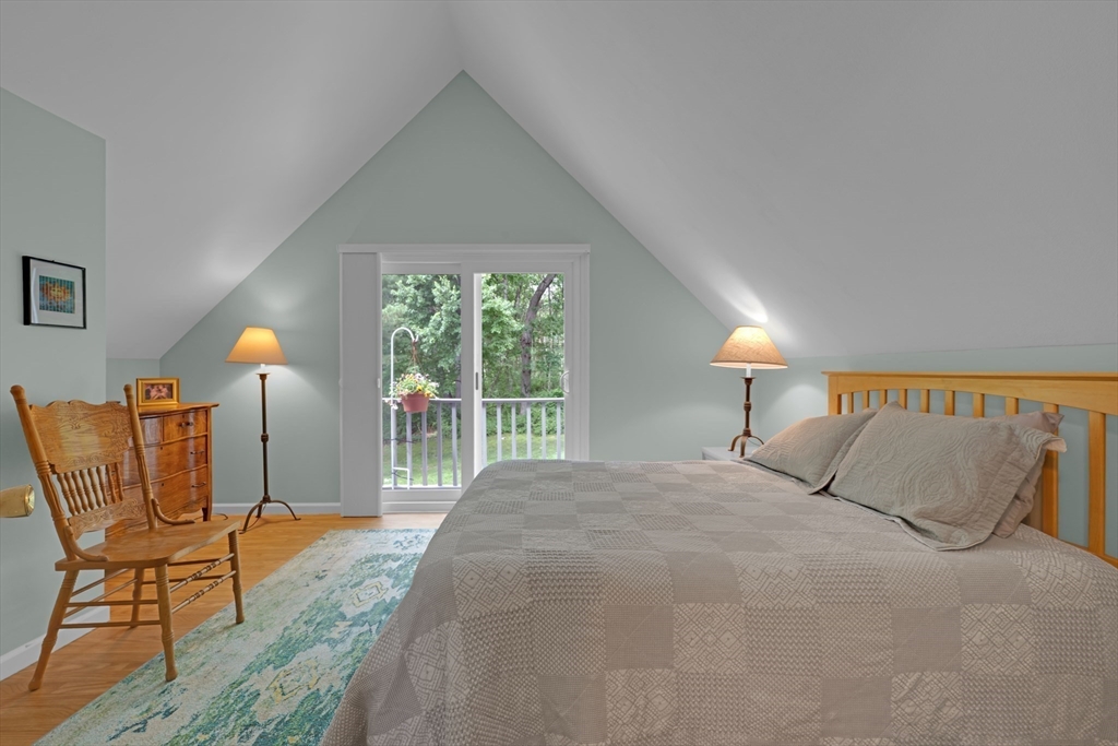 47 Horseshoe Circle Ware, MA 01082 - Photo 27 of 37 a bedroom with a bed chair and window