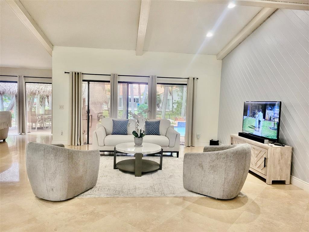 1581 Northwest 100th Way Plantation, FL 33322 - Photo 15 of 53 a living room with furniture and a large window
