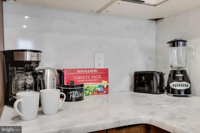 a picture of a room with a flat screen tv