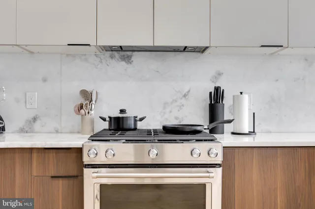 a close view of a stove in the kitchen