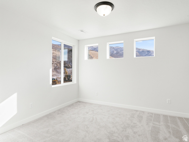 1711 West Canyon Rim Road North Lehi, UT 84048 - Photo 17 of 31 Bright room with light gray carpeting and white walls