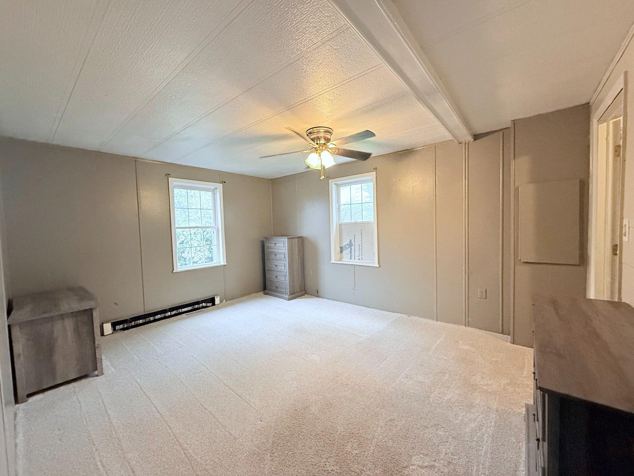 5561 Highland Kane Road Kane, PA 16735 - Photo 11 of 15 Large bedroom with attached laundry and full bath