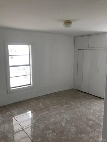 a kitchen with cabinets a sink and a stove