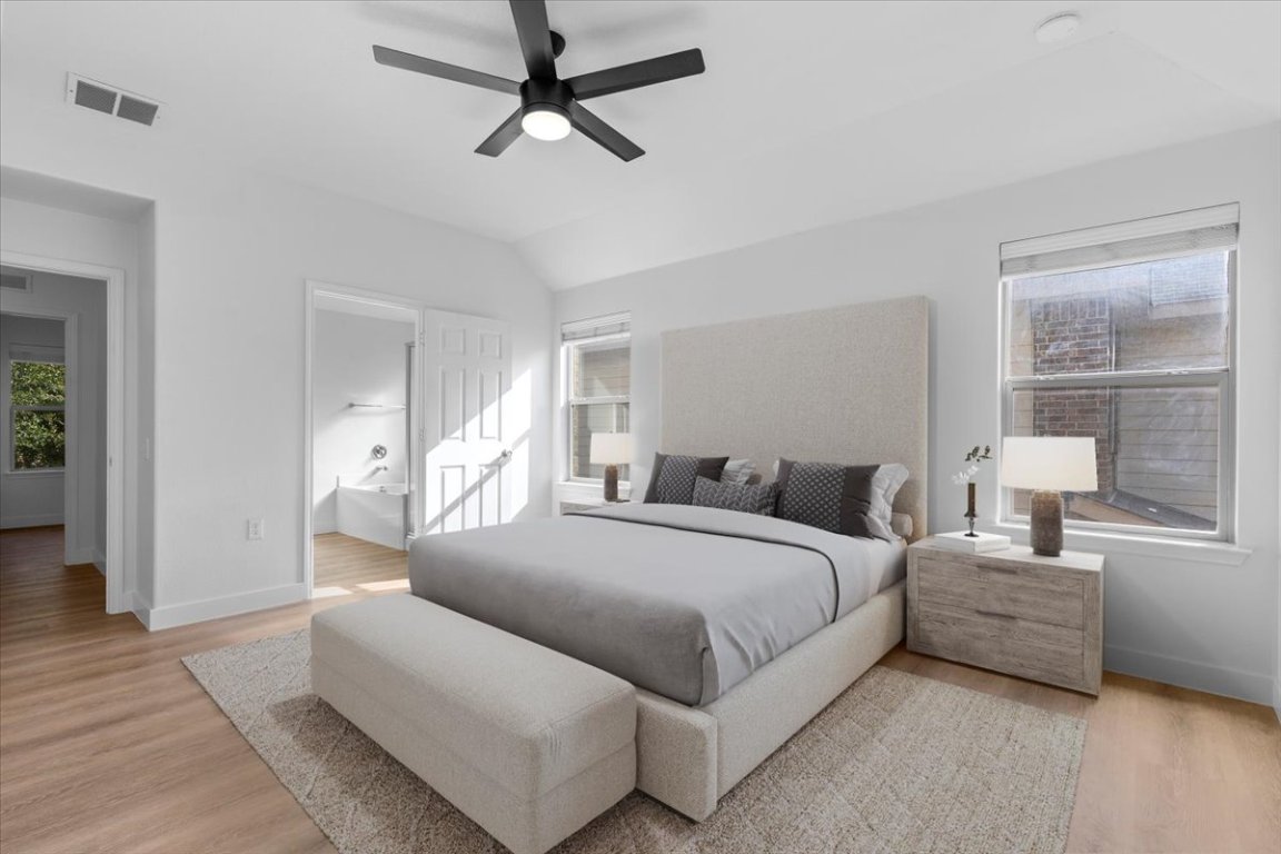 5940 Silver Screen Drive Austin, TX 78747 - Photo 3 of 17 a bedroom with a bed couch and window