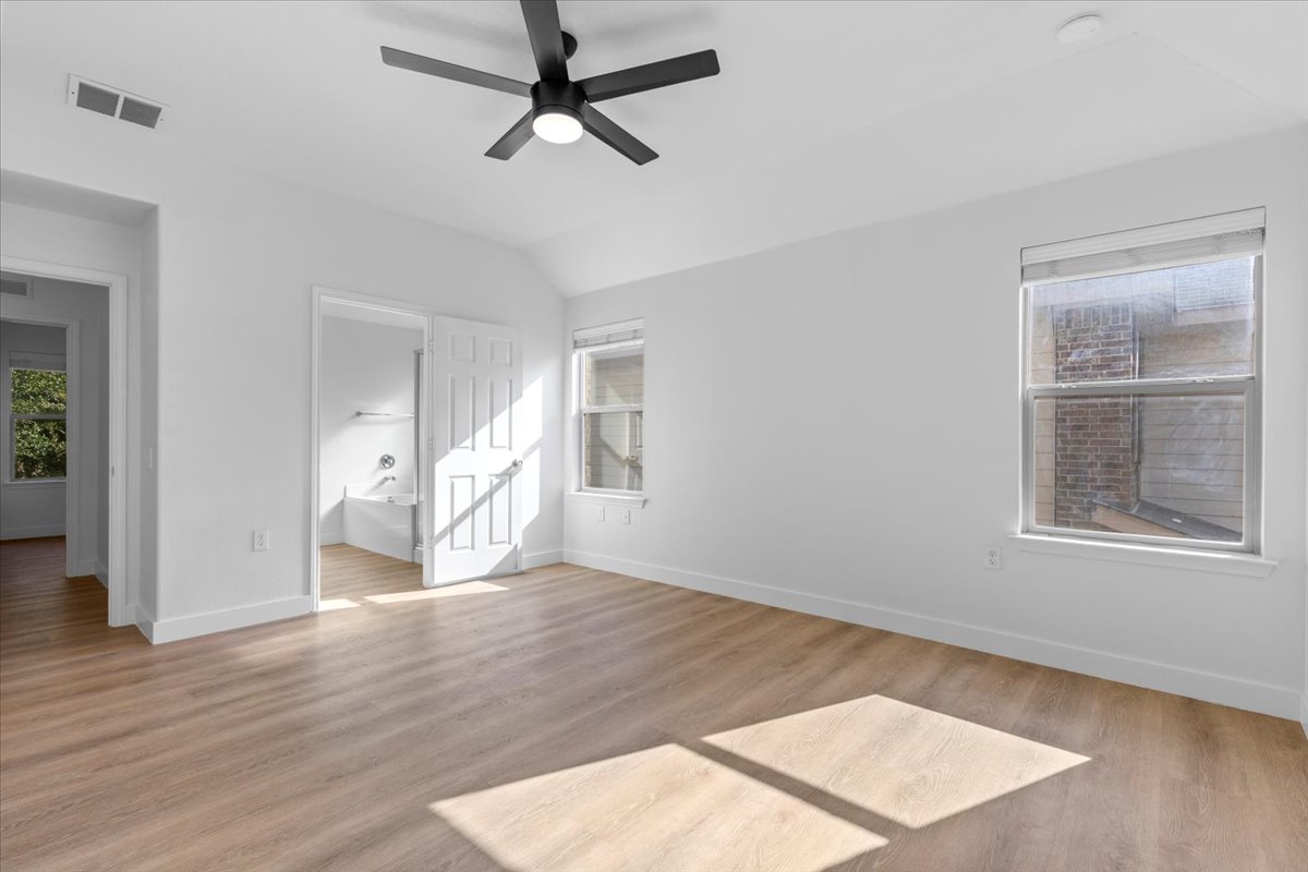 5940 Silver Screen Drive Austin, TX 78747 - Photo 7 of 17 Primary suite with huge, light filled windows