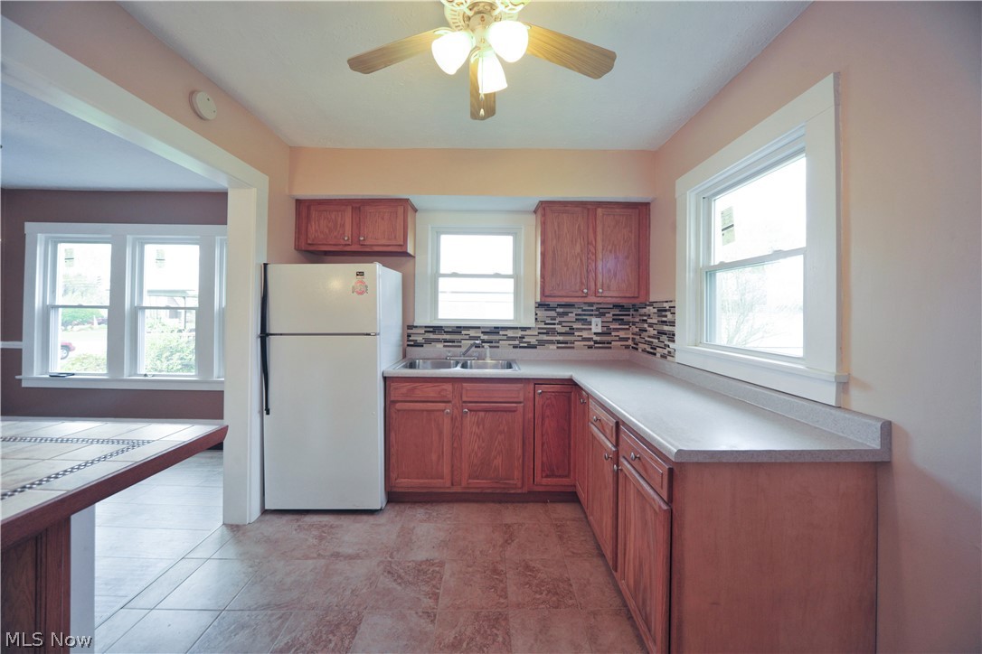 197 Struthers-Liberty Road Campbell, OH 44405 - Photo 22 of 27 Beautiful tile flooring in kitchen, basement steps and landing.