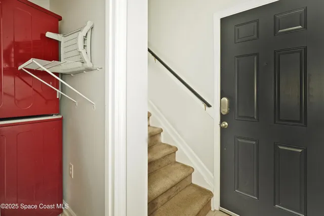 a view of a room with an empty space