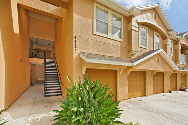 a view of a house with many windows