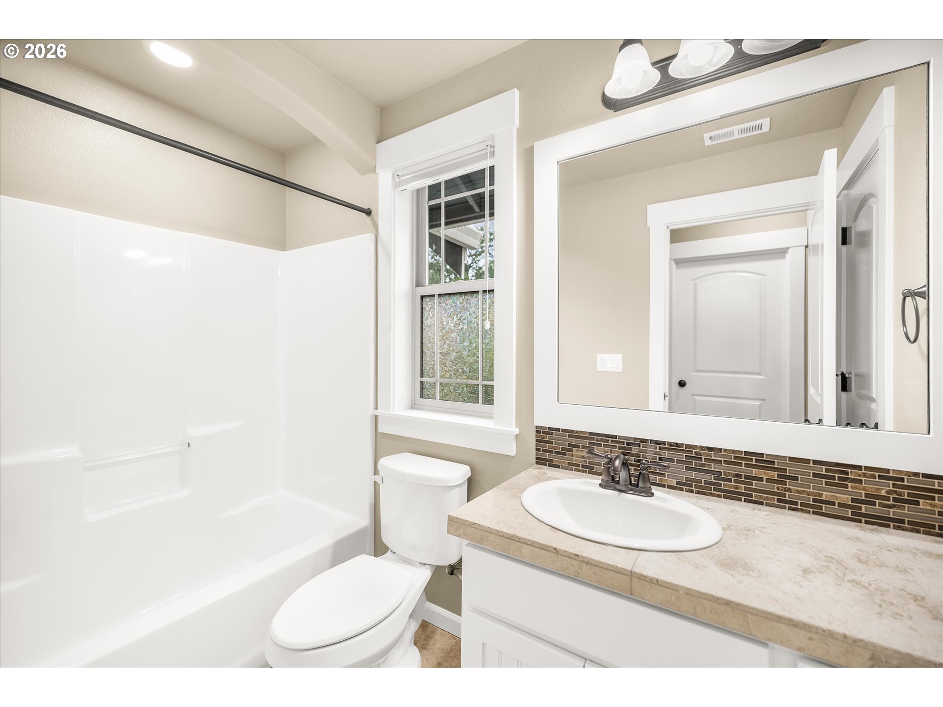 16073 Southeast Pinot Road Milwaukie, OR 97267 - Photo 30 of 44 a bathroom with a sink and a mirror