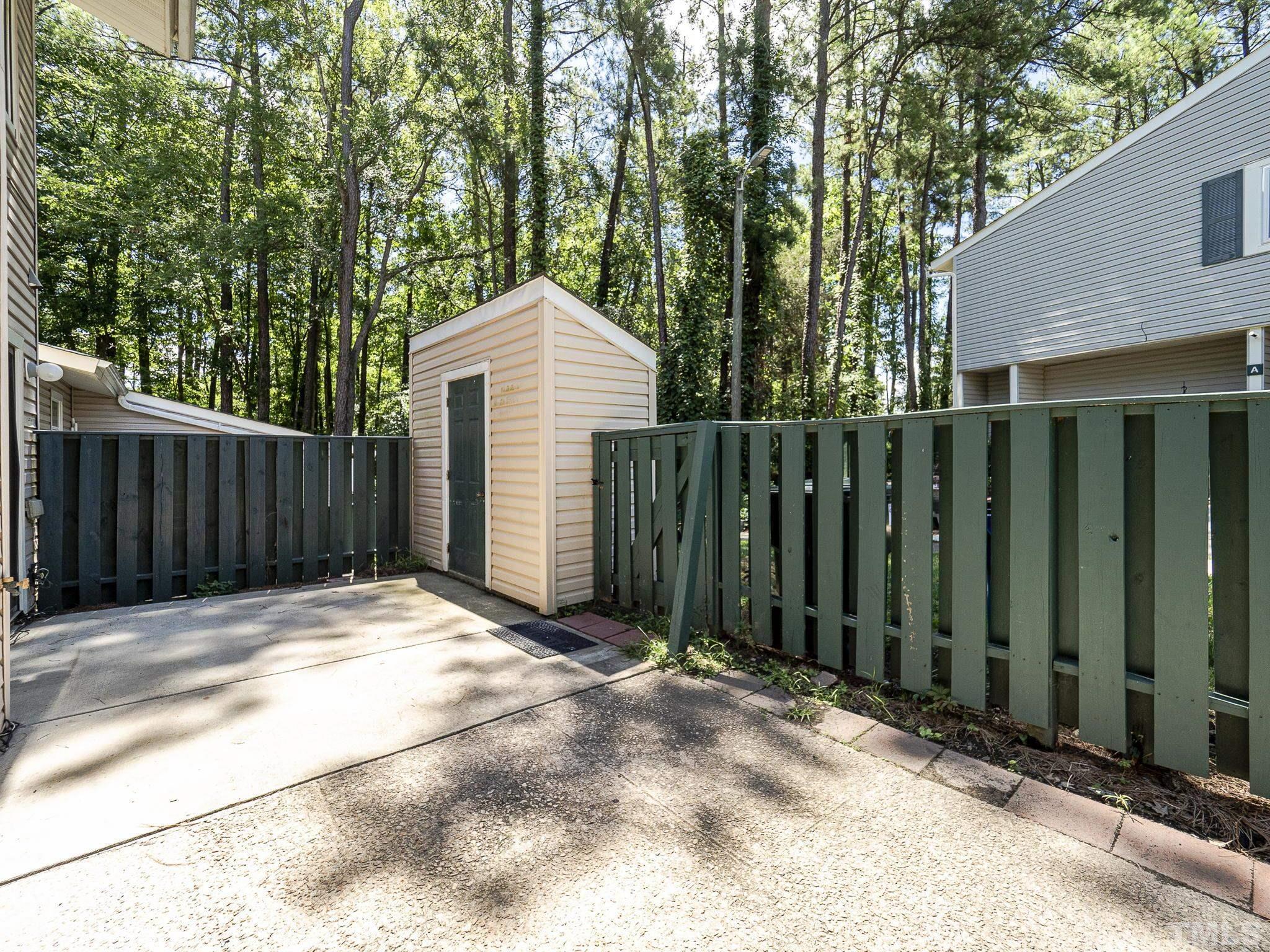 4705 Walden Pond Drive, Unit D Raleigh, NC 27604 - Photo 24 of 24 a view of a wooden fence