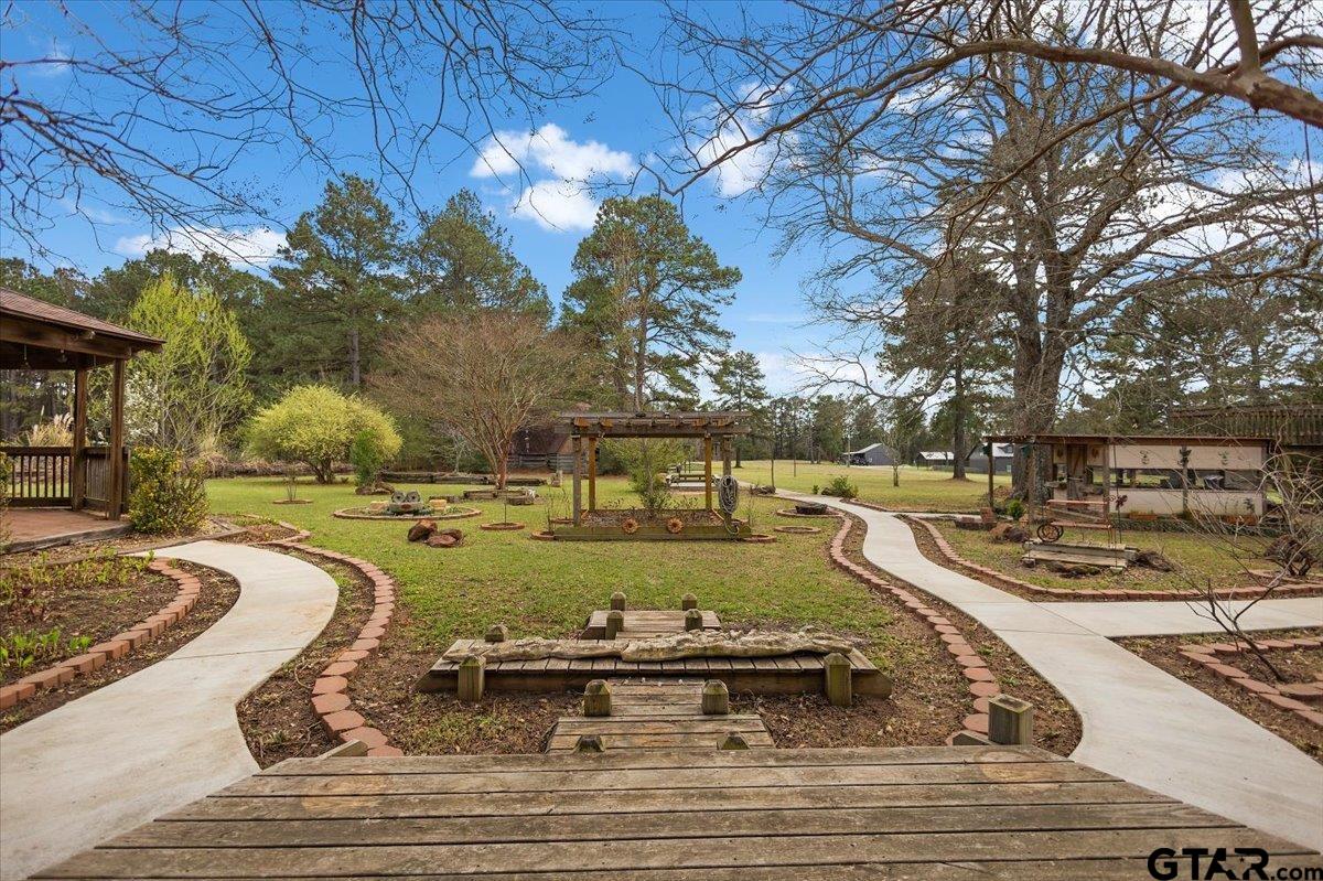 a view of a swimming pool with a patio