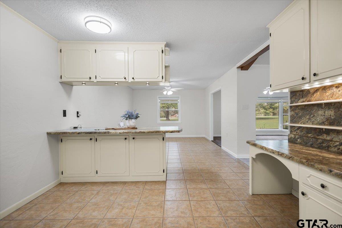 2320 Grangeway Road Marshall, TX 75672 - Photo 12 of 48 a kitchen with a sink cabinets and wooden floor