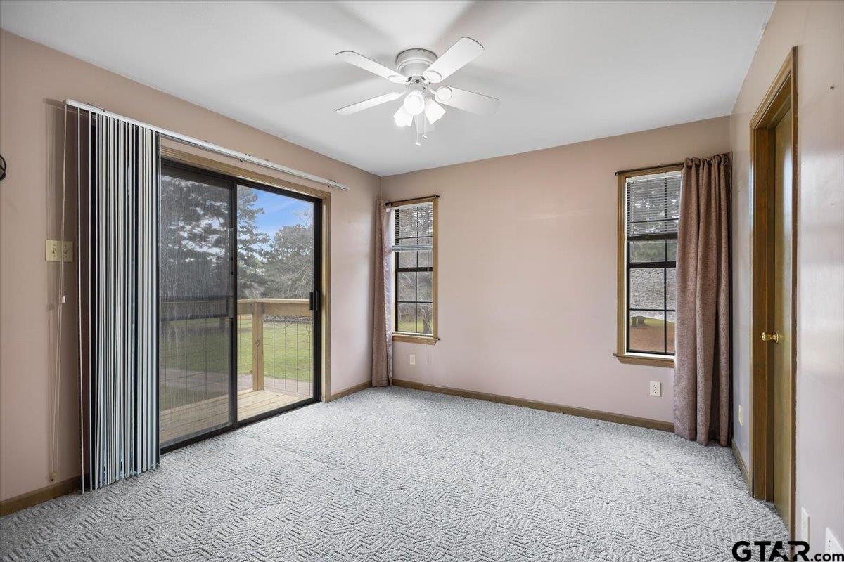 2320 Grangeway Road Marshall, TX 75672 - Photo 43 of 48 an empty room with windows and closet