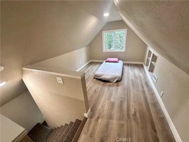 a view of kitchen and wooden floor
